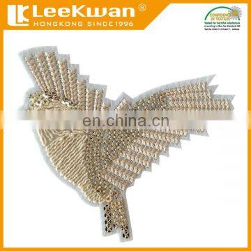 Sequin bird with metal thread embroidery applique