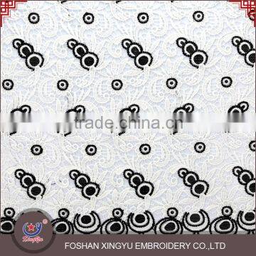 Guangzhou factory supply custom embroidered elastic cutwork lace embroidery designs net dress materials