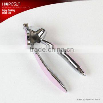 New design pink best zinc-aluminum alloy garlic press slicer with skidproof handle