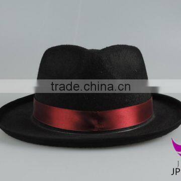 Black cowboy hat setting cap with red ribbon