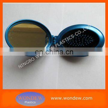 Oval hairbrush mirror