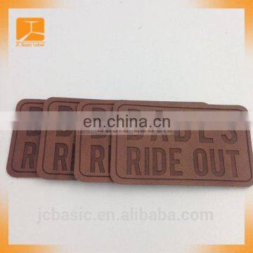 custom embossed black leather garment jacket patch