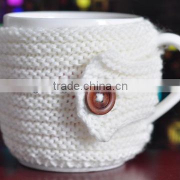 White knitted mug cosy