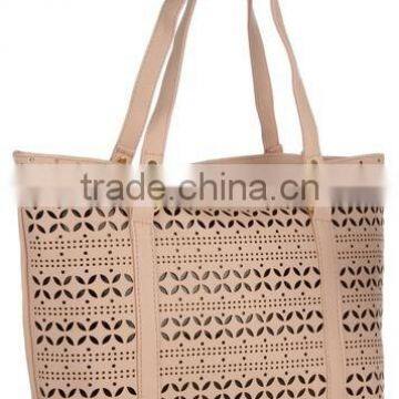 cream color woman handbag perforate handbag