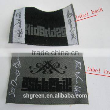 Straight Cut Black Background Black Logo Woven Label
