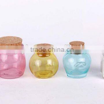 colorful glass candy jar with cork