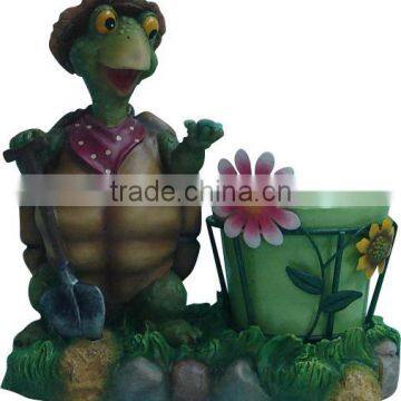 resin turtle figurine with ceramic flower planter