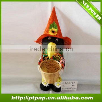 Easter scarecrow with bamboo pot