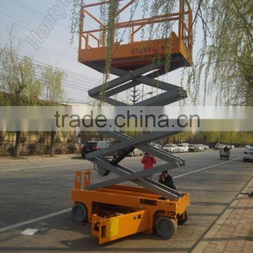 Self propelled mini scissor lift for clean window