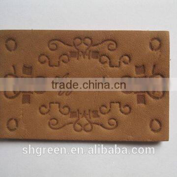 Newly embossed logo real leather label for jacket