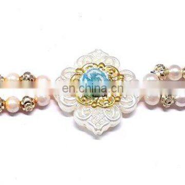 Ratna handicrafts Exclusive Fancy White pearl/stone Rakhi - Indian - RH-Rakhi-309