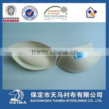 Molded bra cup with push up