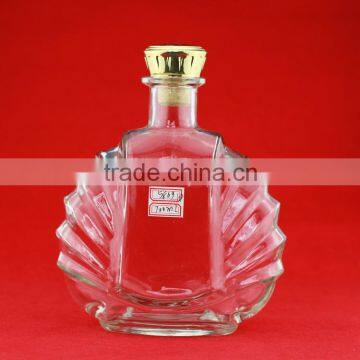 Hot sale palm-leaf fan shape whiskey bottles custom henessylne bottles 700ml white rum transparent bottles