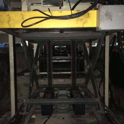 China Evo-Tech rigid chain scissor lift 35Rx2 in pit