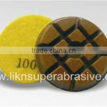 Typhoon-type dry concrete polishing pad with metal chips