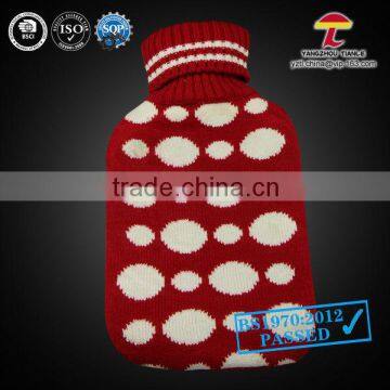 good quality knitted hot water bottle cover red with white dots