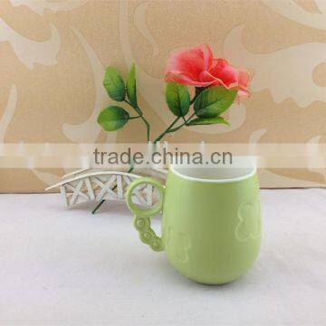 round handle embossed butterfly ceramic cup
