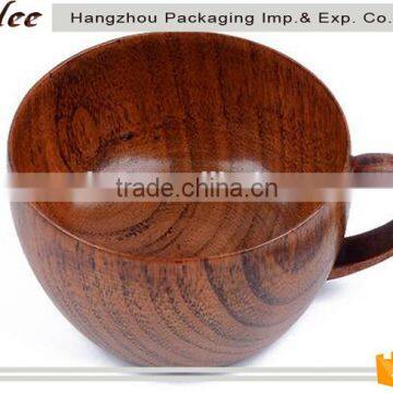wooden cup of tea with handle