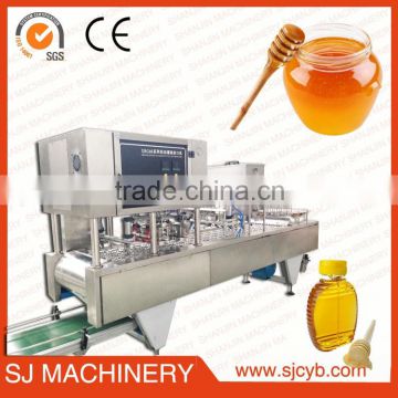 full auto honey cup filling and sealing machine