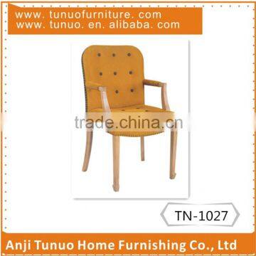 Arm chair,solid wood frame,nailhead around,seat and back with button.TN-1027