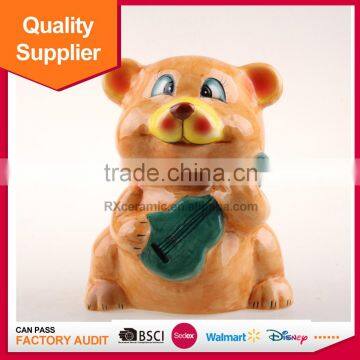 Hot selling new design bear Playing musical instruments shape lovely ceramic piggy bank