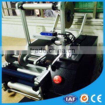 Professional Semi- Automatic Two Sides Round Bottle Labeling Machine With CE and Factory Price photo-2