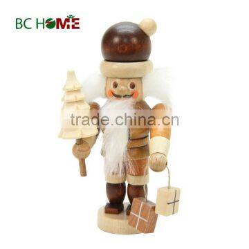 exquisitely crafted santa claus wooden Nutcracker with brown tree