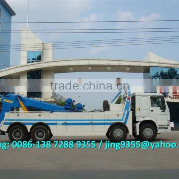 Good Quality 8x4 HOWO 60 ton heavy duty rotator wrecker towing truck for sale