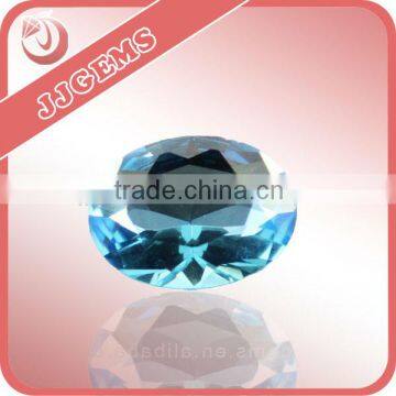 wuzhou fashion rough machine cut oval shape blue spinel stone