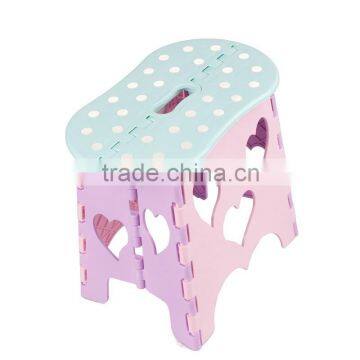 Peanut shaped folding plastic stool