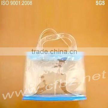 Plastic gift bag with zipper and rope handle