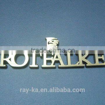 antique embossed metal logo