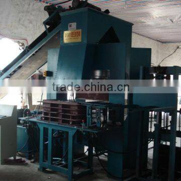 Automatic concrete hollow block machine