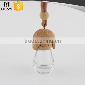 Lovely doll shape hanging decorations wood cap car perfume bottle                        
                                                                                Supplier's Choice