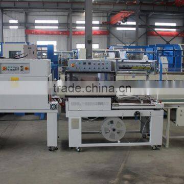 Automatic heat shrink wrapping machine for rope and twine package