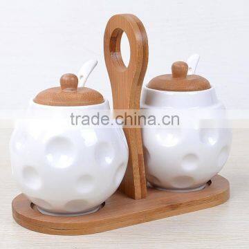 high quality wholesale ceramic spice bottles with wood lid/spice racks jars wholesale/2pcs set ceramic storage jar whole sale