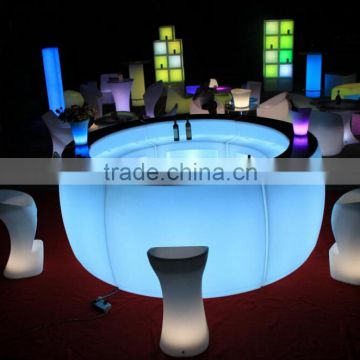 Commercial round plastic illuminated LED bar counter with chairs