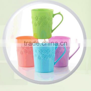 Beautiful plastic mug with engraved flower