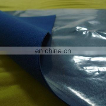 Thermally laminated onto fabric material with seamless decorative film