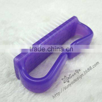 Purple plastic nail polish brush/nail care tools