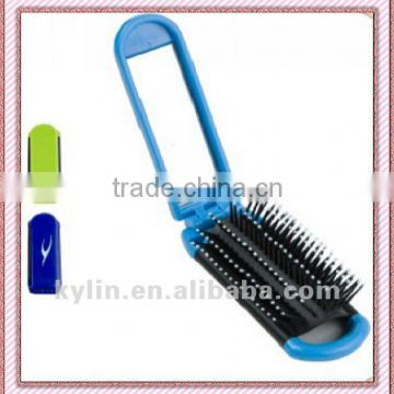 Plastic folding hairbrush with mirror