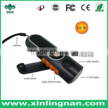 Dynamo LED flashlight radio with cellphone charger