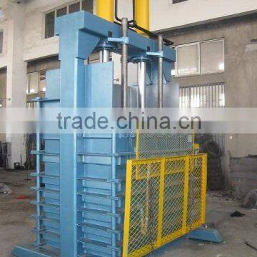 Waste tire baler