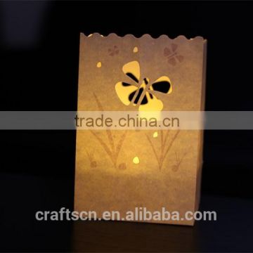 Decorative tea light candle bag made of fire resistant craft paper