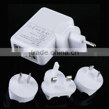 4-Port USB Wall Charger Travel Kit with Interchangeable Plugs (US, UK, EU, AU) for iPhone iPod and other...