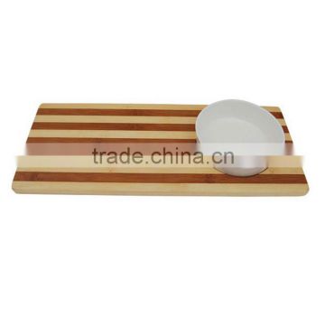 squre bamboo cutting board with ceramic bowl