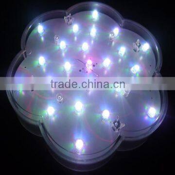 color changing flower shape light with vase base