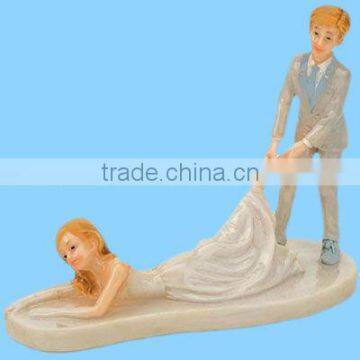 Shiny Resin Groom Dragging Bride Wedding Cake Topper