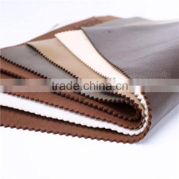 Customized 100% polyester sofa faux leather cheap fabric from china