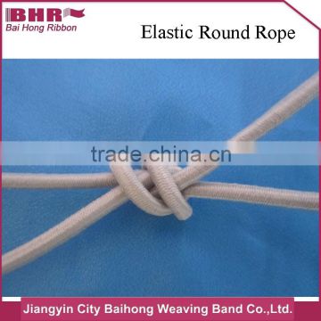 Durable round elastic rubber rope package in roll